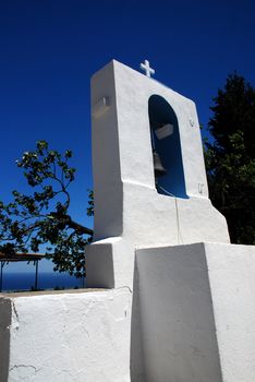 Belfry of the church in Zia - mountain village on Greek island Kos