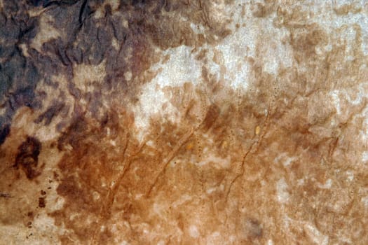 Aged paper with burned marks