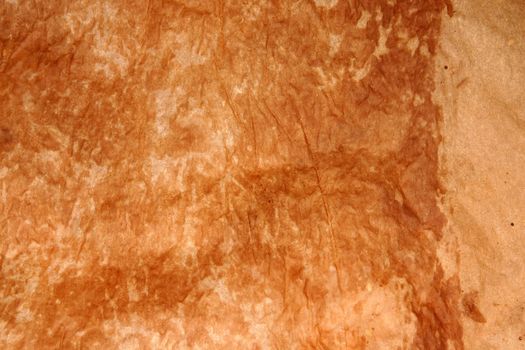 Aged paper with burned marks