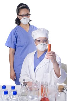 Young scientist in laboratory with test tubes and chemicals