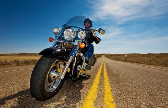 A biker enjoying a ride in the country side