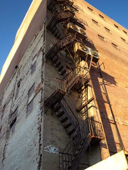 An old city building with a fire escape 