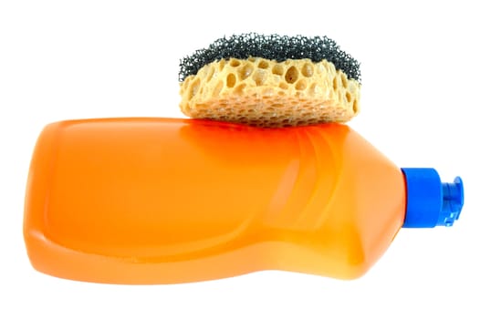 Detergent in orange plastic bottle and sponge on isolated background