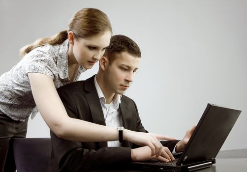 Young man and woman working together