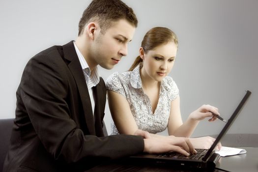 Young man and woman working together