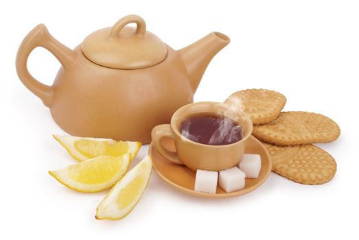 set of the earthenware teapot, cup of tea, lump shugar, sliced lemon and biscuits isolated on white background with clipping path          