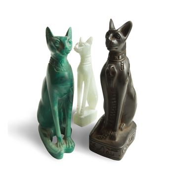 Stone Egyptian cats on a white background 