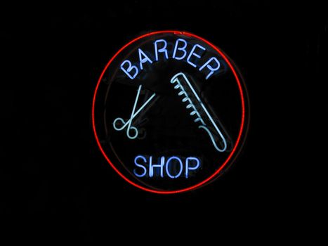 Neon BARBER SHOP sign with scissors and comb