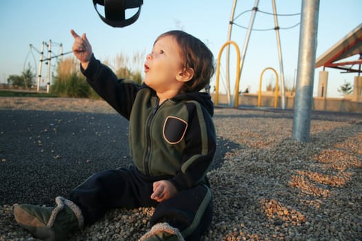 Little Baby boy playing in the park