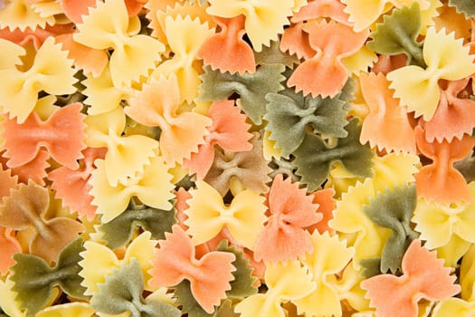 Colored pasta forming a appetizingly background.