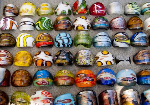 Assortment of large rings at an outdoor market