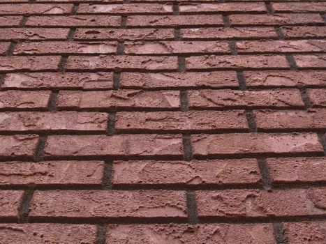 Angle view of a red brick wall
