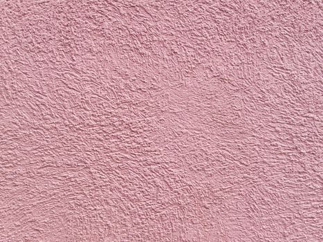 Salmon pink color stucco exterior wall