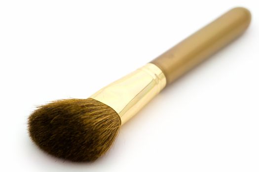 Brush for a make-up on a white background