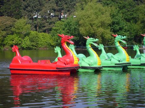 Dragon boats on boating lake in Peasholm Park, Scarborough, England.