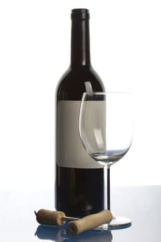 Alcohol - a bottle of wine on light background