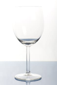 Alcohol - a glass of wine on light background