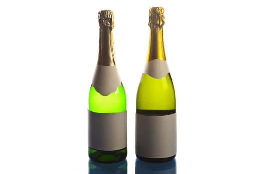 Beautiful big green bottles of chilled champagne on a delicate background