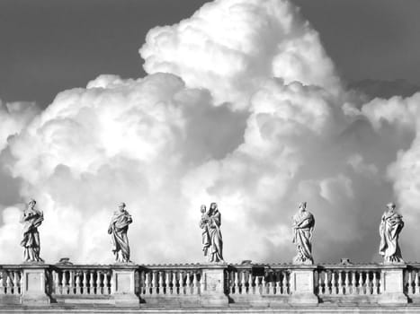 statues in s.pietro in rome whit clouds