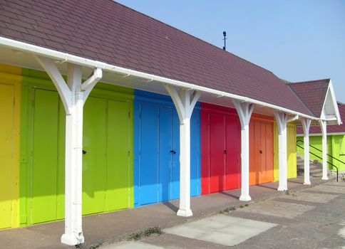 Colorful beach chalets by seaside, Scarborough North Bay, England, U.K.