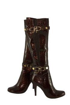 Pair of leather high female modelling boots isolated