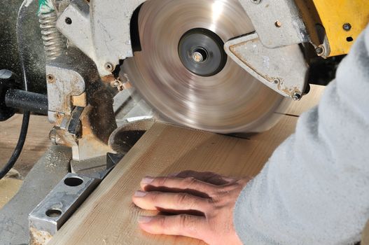 
segment boards circular saw for cladding the walls of a wooden house