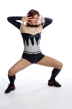 young girl in balck and white stage costume on white
