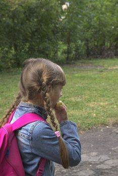 schoolgirl in a park