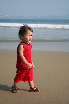 Little boy playing on the beach