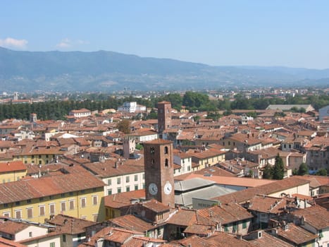 Lucca is a historycal town in Tuscany surrounded by city walls