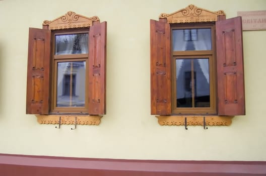 Wooden windows of a cafe on Andreevskaya Street