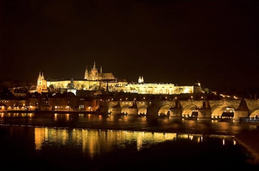 Prague Castle and Charles bridge at night