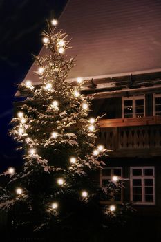 lighted christmas tree in the early afternoon