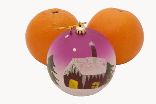 Oranges with a toy on the white background