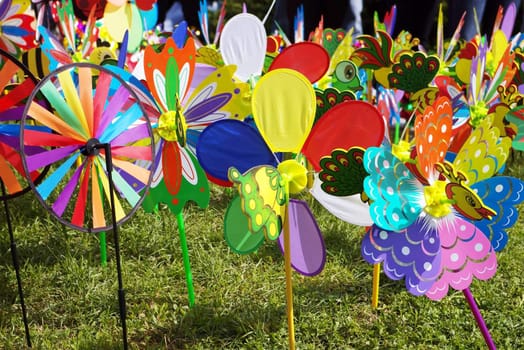 a lot of colorful pinwheels for kids