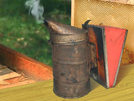 Image of the special device for neutralization of bees by a smoke gathering honey
