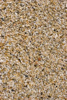 Wet pebbles on a beach