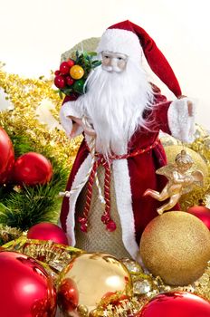 Happy Christmas toy Santa. It is isolated above a white background