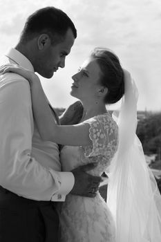 The bride looks in the face to the groom