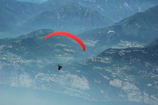 Paragliding in the Alps with mountains scenics