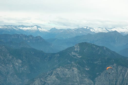 Paragliding in the Alps with mountains scenics