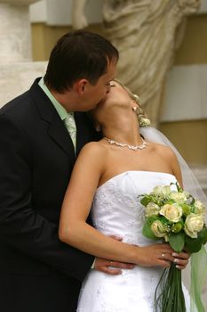 Kiss of a newly-married couple