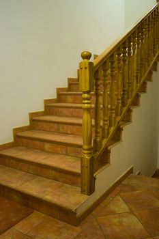 Staircase in a house with wooden balusters.