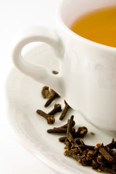 Detail of tea cup with saucer and decoration.