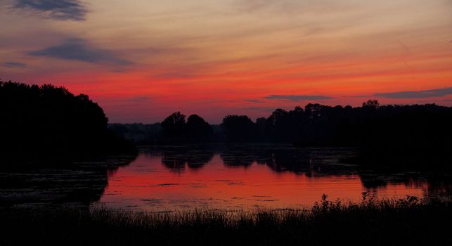 Beauty colorful sky small lake - sunset in Poland