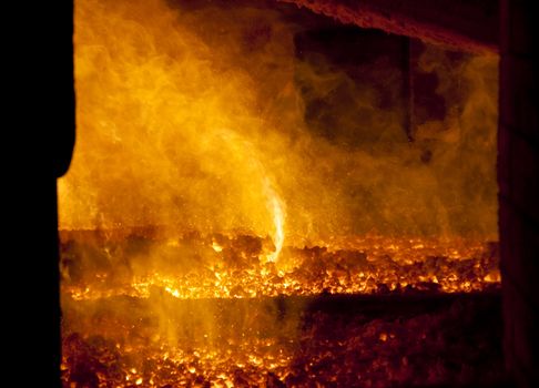 Orange fire in big furnace - power station - Poland