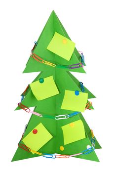 isolated Christmas tree made of cardboard, decorated with stationery  (stickers, paper clips, pushpin)