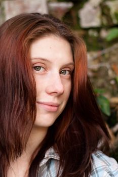 Portrait of young girl with red hair
