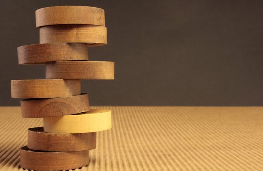 a white checker among a stacked black checkers