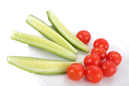 Vegetables, Cucumber and Tomatoes Cherry on White Plate